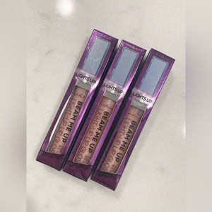 Lulu Beam light me up lip gloss. Three available. All sealed.